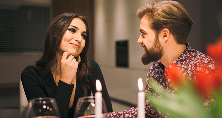 cheerful-man-woman-enjoying-dinner