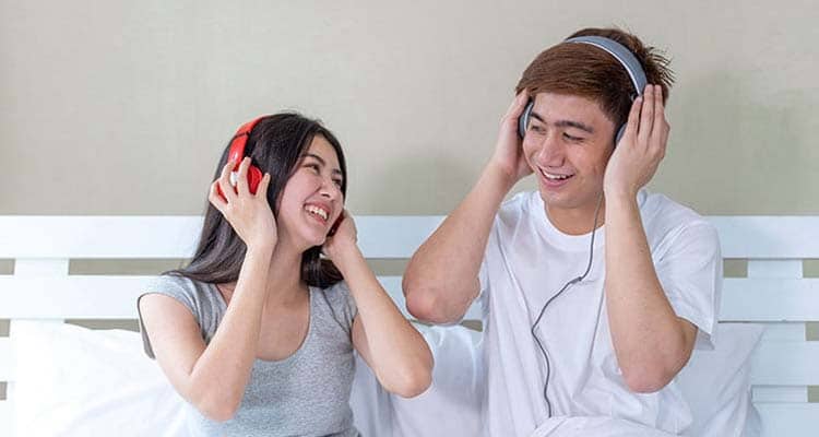Couple enjoying music
